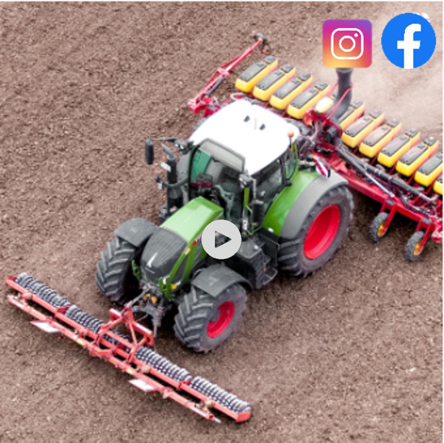 Tractor on the field sowing Strube sugar beet seeds