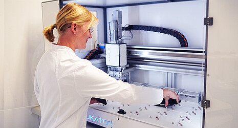 Biotechnologist von Strube is in the laboratory