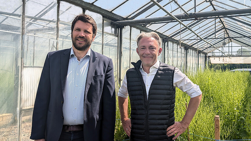 Andreas Albersmeier and Marcel Landmann in greenhouse